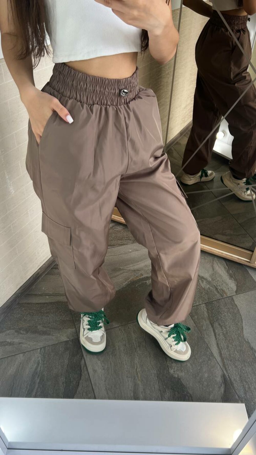 Модні штани з кишенями какао