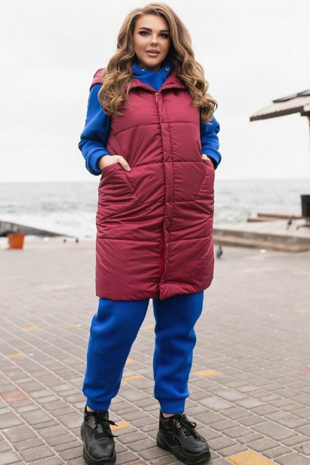 Красная жилетка с карманами