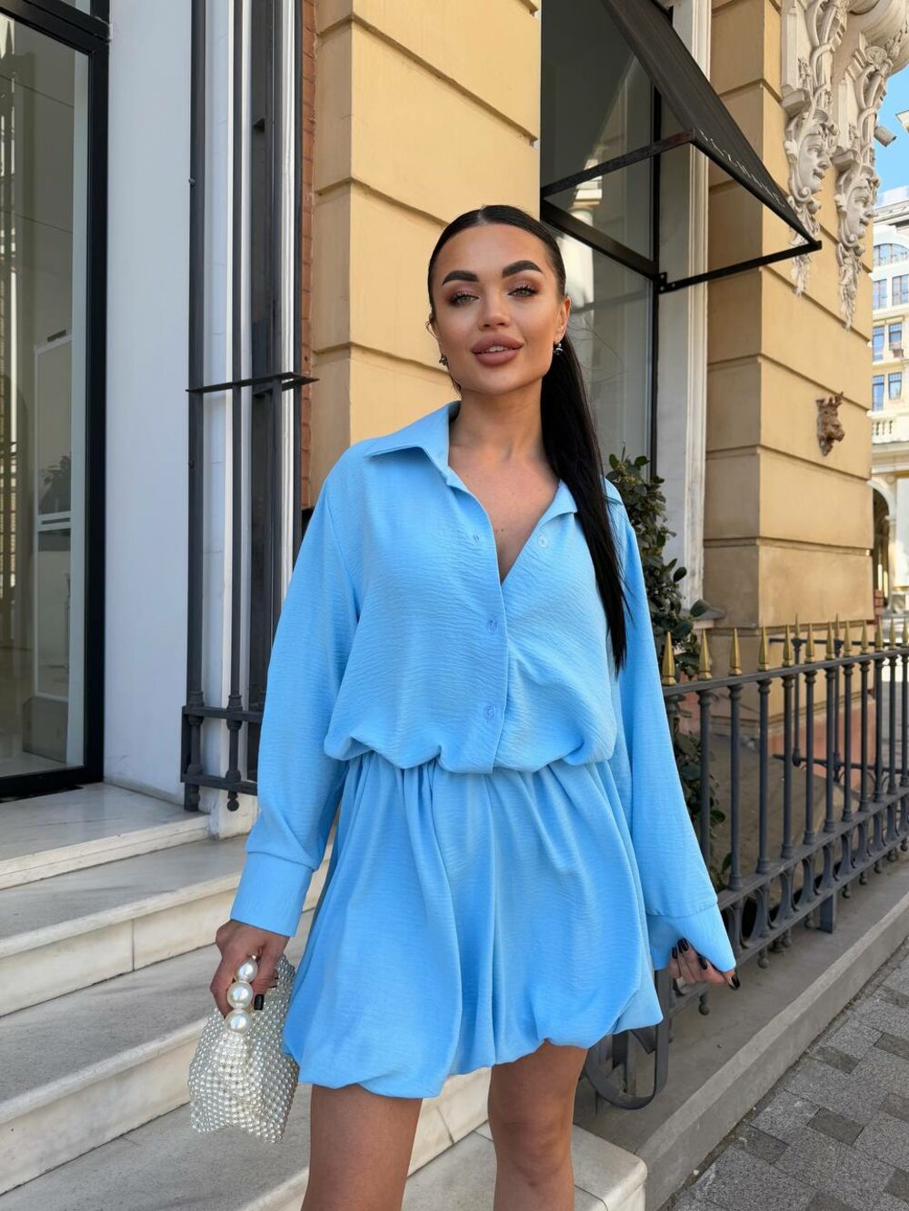 Костюм складається з сорочки та спідниці, колір блакитний