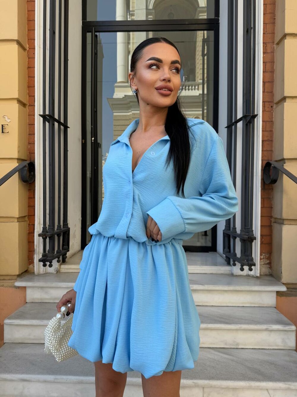 Костюм складається з сорочки та спідниці, колір блакитний