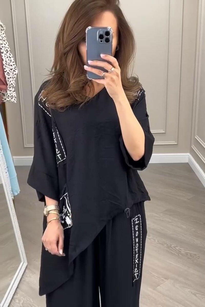 Костюм із штанів та асиметричної блузки, колір чорний