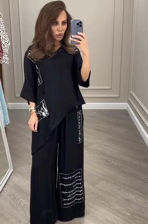 Костюм із штанів та асиметричної блузки, колір чорний