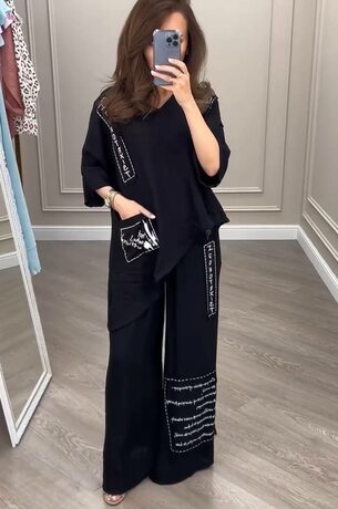 Костюм із штанів та асиметричної блузки, колір чорний