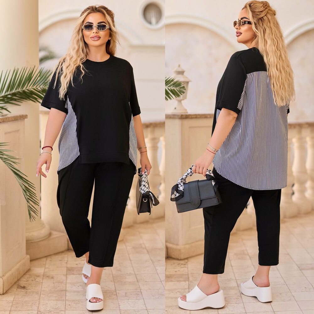 Прогулянковий костюм складається з штанів і кофти зі вставками з боків, колір чорний