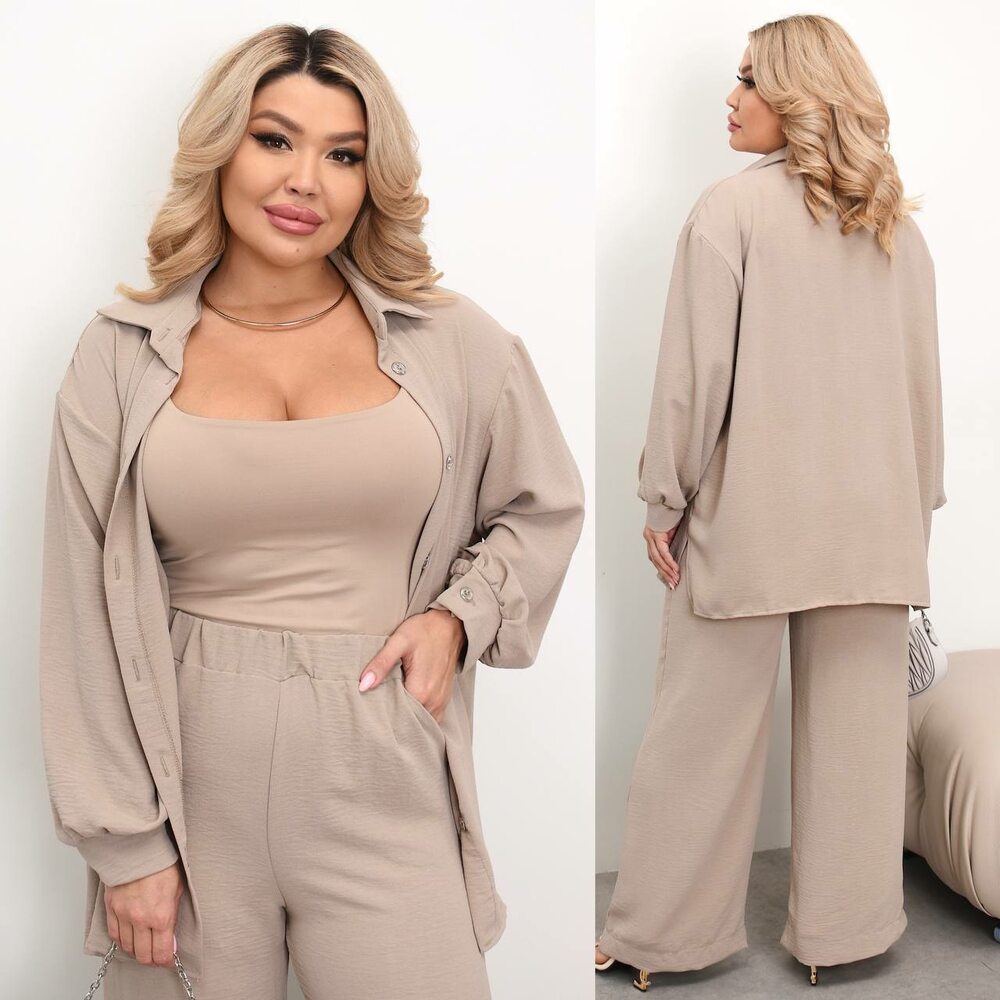 Костюм складається з брюк палаццо та сорочки, колір бежевий