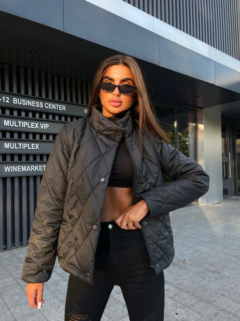 Стеганая курточка на плащевке черного цвета